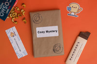 Read It & Eat Blind Date with a book.  Each box contains a food story, an artisanal snack, and a $5 donation to fight hunger in Buffalo, NY