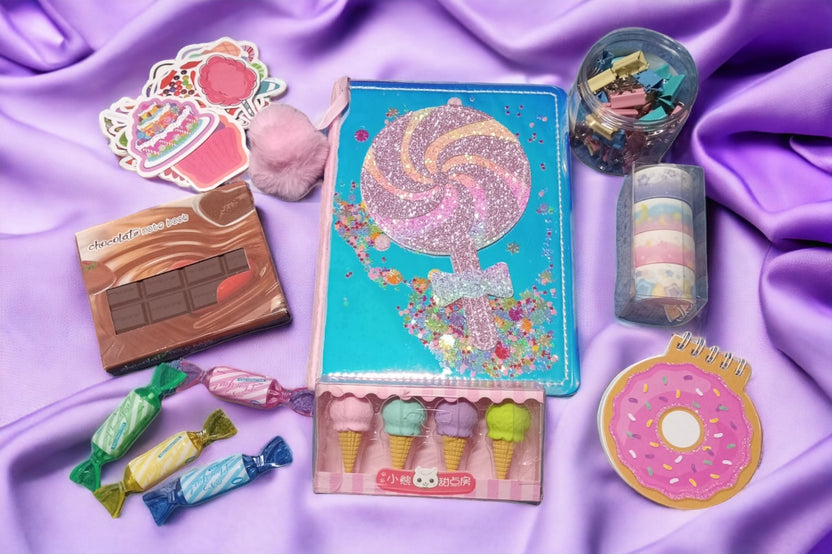 Sweet Treats Stationery set. Includes journal, erasers, washi tape, candy pens, notebook, stickers, paper clips, 