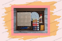 Open the DIY kit, thoughtfully curated with all necessary items to create the mesmerizing Interlocking Circles wood inlay art piece.