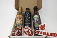 SCOVILLED hot sauce of the month subscription box featuring Heartbreaking Dawn, Heartbeat Sauces, and Julz's Creations