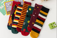Antique-style knee-high socks, tinged with Christmas nostalgia, lend a touch of vintage elegance to our seasonal wardrobe.