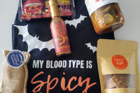 box filled with spicy food items to celebrate Fall. Box includes items for Halloween and items to make Thanksgiving a spicy one.