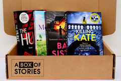 Brown subscription box filled with four surprise mystery books, featuring captivating stories and intriguing plots for genre enthusiasts.
