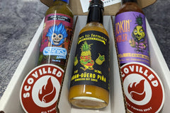 SCOVILLED hot sauce of the month featuring Stanky Sauce, Down to Ferment, and Up All Night Bottling Co