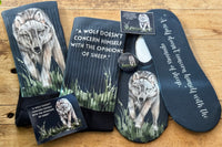 Step into style and comfort with wolf socks with the saying "A wolf doesn't concern himself with the opinions of sheep."  