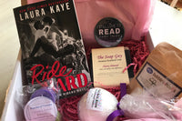 Bubbles & Books subscription box featuring a romantic novel, handmade soap, and bath products for relaxation