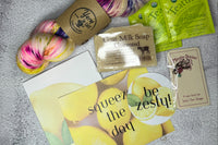 July 2023 box--You can always expect a carefully curated box with great yarn and 3-4 fun notions with a tea sampler.