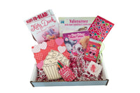 Colorful activity sheets from The Storytime Box featuring counting and addition exercises for children in a subscription box