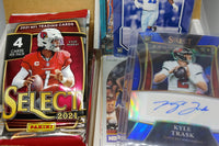 A sample of our Football Sports Subscription Box featuring an autograph card in addition to our card packs and repack.