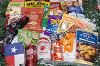 Pictured is beef jerky, a bandana, cornbread mix and honey, mexican seasonings, takis, Bucc-ees nuggets and sunflower seeds, and soda pops.