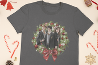 A cChristmas Themed Harry Potter Tshirt. The 3 main kids are in a wreath for the design. The shirt is surrounded by candy Canes.