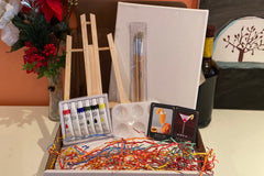Enjoy a Paint and Sip Box or give as a gift. Each box contains an easel, a canvas, paint, a tray, and brushes. 