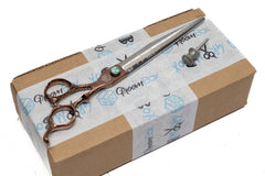 August 2023 GroomBox Lite, 8" Woodsman micro-serrated straight shears and a nail grinding drum on a small box with logo tape. 