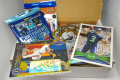Another example of our monthly All Sports Subscription Box featuring an autograph card plus unopened packs and a repack.