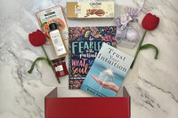 The Stress Relief Adult Coloring Book Box will include a book, an adult coloring book, colored pencils, as well as 2 - 3 self-care products.