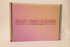 Rainbow Pastel Box with Crazy About Stickers Logo on the front of the box. Each subscription will be sent to your house in this box.
