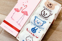 These cute socks feature playful, smiling animal faces, perfect for adding a touch of whimsy to your outfit.