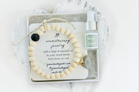 Raw Wood Diffuser Bracelet with Gray Jade Triangle Charm in White Gift Box with Aromatherapy Instruction Card and Woodlands Mini Oil Dropper