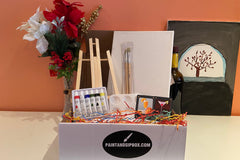 Enjoy a Paint and Sip Box or give as a gift. Each box contains an easel, a canvas, paint, a tray, and brushes. 