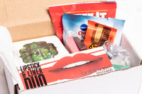 A Shark Week Survival Kit period subscription box featuring essential supplies for a comfortable and confident experience. 