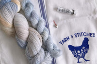 Beautiful Hand Dyed Yarn twisted into a Skein along with lovely extra items that are consistent with the colorway 's theme
