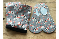 Strawberry Milk Cow Crew and No-Show Socks with a grey background.  White, Black, and Reddish/Pink with cute cows and strawberries.