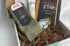 That Road Trip Mom's Escape and Explore Box: New Adventures. Includes Worn Brand Socks, Balsam hand Lotion, Camping Journal and Yeti Magnet.