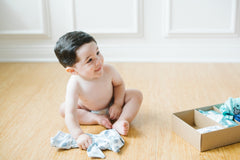 Cute baby boy with his Surprisly box