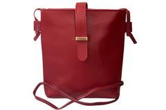 Red faux leather crossbody bag with zipper closure, buckle closure and adjustable straps.  Perfect for phone, wallet and keys.