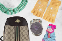 An Oliver Christopher's Boutique Box gift set, including a purse, a bag, and a necklace from Oliver Christopher's Boutique.