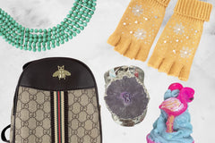 An Oliver Christopher's Boutique Box gift set, including a purse, a bag, and a necklace from Oliver Christopher's Boutique.