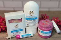 Love Spell February Special scent. Bottle of goat milk lotion, bar of soap, sugar scrub, and a Watermelon lip butter