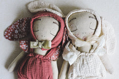 Exclusive Subscription of two handmade fabric dolls for children.