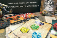 Dungeon Crate™ subscription box featuring exclusive member card, flame miniatures, and a treasure token for roleplaying games