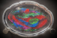 A vibrant green resin art piece with crystal accents, featured in The Joy of Resin Art subscription box