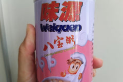 This is "Eight Treasure Congee" produced in China, packaged in Hong Kong, made of several kinds of beans and rice. 