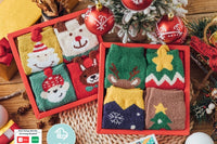 Old-fashioned Christmas stockings, featuring traditional holly and berries, evoke a sense of tradition and the time-honored customs 