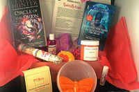 Bubbles & Books subscription box featuring a romantic novel, handmade soap, and bath products for relaxation