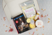 Bubbles & Books subscription box featuring a romantic novel, handmade soap, and bath products for relaxation