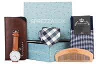 A SprezzaBox monthly subscription box featuring a watch, tie, socks, and a wooden comb for men's accessories