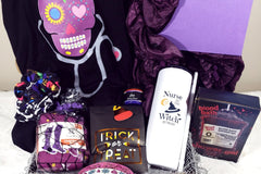 October 2022 spooky nurse subscription with Nurse Witch personalized tumbler, sugar skull black tshirt, compression socks, blood bath