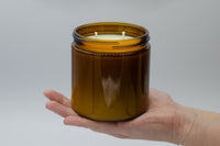 Our team does every step of the candle making process by hand, from putting wicks in the candles to designing the labels.