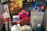 Bubbles & Books subscription box featuring a romantic novel, handmade soap, and bath products for relaxation