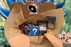 Tap For Tea Mythic Box. Contains four sealed Magic: the Gathering packs, one premium tea packet, one box topper single card, and a surprise.