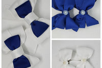 Taste full bowtie hair bows and tails down bows made of grosgrain ribbon with pearl embellishments. 