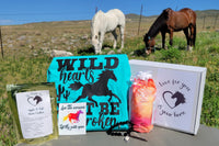 The Stable Box Subscription - horse graphic tee, horse treats, pink/orange saddle pad cover, vinyl sticker and bracelet.