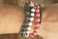 Namakula Bracelet made from several strands of paper beads and tiny silver beads, handmade in Uganda.