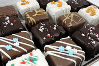 Image of a box of our Winter Combo including our winter flavors, the Peppermint Brownie Bite and the Gingerbread Blondie Bite.