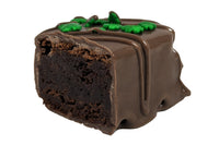 Close-up image of the Irish Cream Brownie Bite. This is our classic brownie infused with irish cream, dipped in milk chocolate.