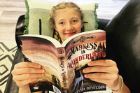 Madness in Wonderland is a big hit in our home. Christian fiction is not boring! Look at that face. 